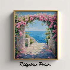 the painting is hanging on the wall above the door to the ocean and pink flowers