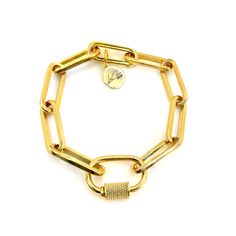 Our chunky 16 inch Throwback Link Charm Bracelet is dipped to perfection in 24k gold. This look can be worn so many different ways. You can style it alone or layer it with some of our other favorites for a totally gorg look. You can dress it up for a night on the town or dress it down with a pair of jeans and a t-shirt! You can't go wrong with this piece. Don't forget to add your favorite charms too! Features: Lightweight Comfortable to wear Versatile Eye-catching and boho design High-quality di Bold Adjustable Gold Jewelry, Everyday Metal Bracelets With Gold Clasp, Everyday Link Chain Bracelet With Gold Clasp, Modern Chunky Gold Bracelets, Modern Chunky Bracelets For Everyday, Adjustable Gold Bracelet With Chunky Chain, Everyday Chain Bracelet With Gold Clasp, Everyday Gold Chunky Bracelets, Bold Gold Bracelets For Gift