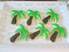 decorated cookies in the shape of palm trees