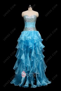 Sparkly and classic, this blue prom dress features a strapless sweetheart neckline adorned with vast diamond crystals and ruffled organza floor-length skirt. Custom Made Prom Dress, Prom Fashion, Blue Organza, Strapless Prom Dress, Blue Cocktails, Blue Prom Dress, Long Prom Gowns, Cocktail Dress Prom, Dress Closet