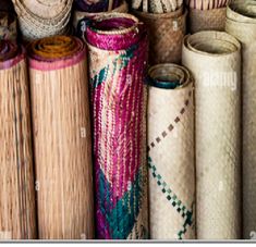 many different types and sizes of woven fabric on display