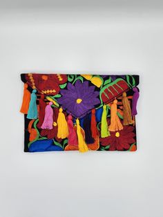 Handmade embroidered envelope clutch made by Indigenous Communities in Mexico. With each purchase, you get a unique piece that is handmade with love by artisans from Mexico. More styles here: https://www.etsy.com/shop/fridamiacollection/?etsrc=sdtHandmade embroidered envelope clutch made by Indigenous Communities in Mexico. With each purchase, you get a unique piece that is handmade with love by artisans from Mexico. More styles here: https://www.etsy.com/shop/fridamiacollection/?etsrc=sdt- Summer Accessories Handmade Purse, Indigenous Community, Handmade Purses, Envelope Clutch, Summer Accessories, Boho Hippie, Clutch Handbag, Mom Gift, Gift For Mom