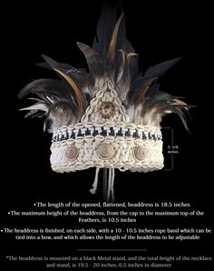 A Handmade headdress of white braided Rope, decorated with rows of cream Cowrie Shells, a band of groups of white and black beads, each group in a triangular pattern, four domed seashells and a border of mixed black, white, brown, and grey natural patterned Feathers. The length of the opened, flattened, headdress is 18.5 inches, and the maximum height of the headdress, from the cap to the maximum top of the Feathers, is 10.5 inches. The headdress is finished, on each side, with a 10 - 10.5 inche Bohemian Costume Hat With Structured Crown For Festivals, Adjustable Teardrop Crown Headpiece For Festivals, Adjustable Tall Crown Headpieces For Festivals, Adjustable Tall Crown Headpiece For Ceremonial Occasions, Ceremonial Headpiece With Tall Crown, Adjustable Crown Costume Hat For Festivals, Traditional White Hat Bands For Festival, Traditional Tall Crown Headpiece For Festivals, Traditional Tall Crown Festival Headpieces