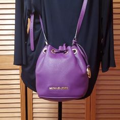 Small Crossover Adjustable Strap , Never Used. No Tags Attached. Designer Purple Bag With Gold-tone Hardware, Luxury Purple Shoulder Bag With Adjustable Strap, Designer Purple Bags With Gold-tone Hardware, Designer Purple Travel Bag, Luxury Purple Bag With Branded Hardware, Luxury Purple Pouch Bag, Designer Purple Shoulder Bag With Removable Pouch, Designer Purple Crossbody Bag, Purple Leather Bags With Removable Pouch