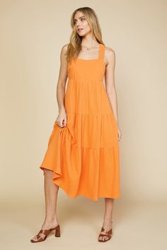 The bright, fun color and ruffled straps that crisscross at the back make this maxi dress a standout for beach getaways and warm days under the sun. Featuring a softly crinkled texture, it's got a relaxed, easy shape that's finished with an ankle-grazing tiered hem. •Crisscross back •Relaxed fit •Tiered hem Item Number: 99620 Vacation Dresses Casual, Wedding Guest Dress Trends, Maxi Sundress, Easy Shape, Casual Wedding Dress, Fun Color, Beach Getaways, Cotton Maxi, Tiered Maxi Dress