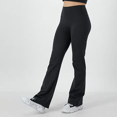 Cut to a mid-rise this pair of Champion women's pants are made from soft recycled fabric with stretch for added comfort. They have a smooth elastic-waistband with slim fitting flare legs. Wear them with a sports bra and grippy socks to move into yoga poses.Front Style: Flat FrontFeatures: Comfort WaistbandClosure Type: Full ElasticFit: Slim FitRise: Mid RiseFiber Content: 78% Recycled Polyester, 22% SpandexFabric Description: WovenInseam: 31 1/2 InLeg Style: Flare LegCare: Tumble Dry, Machine Wa Solid Color Elastane Sports Pants, Solid Compressive Mid-rise Pants, 4-way Stretch Elastane Gym Pants, Mid-rise Elastane Gym Pants, Mid-rise Moisture-wicking Bottoms, Athleisure Elastane Pants With Moisture-wicking, Stretch Moisture-wicking Bottoms In Recycled Polyester, Athleisure Moisture-wicking Elastane Pants, Comfort Stretch Elastane Pants With Moisture-wicking