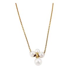 This lovely authentic necklace is by Mikimoto. It is crafted from 18k yellow gold. The pendant features a cross like design with a pearl on each point, the small pearl at the top and the larger size below. The two sides same size pearl. The chain is fitted through the two side pearls and it is signed by the designer with the metal content.    Material: 18k yellow gold  Hallmark: M K18  Measurement: Chain:  17" long  Pendant: 0.60" long x 0.48" wide   Pearls are: 4mm-6mm  Weight: 3.6 grams Mikimoto Pearls, Yellow Gold Pendants, Long Pendant, A Cross, Gold Pendant Necklace, Gold Pendant, Hallmark, Two By Two, Yellow Gold