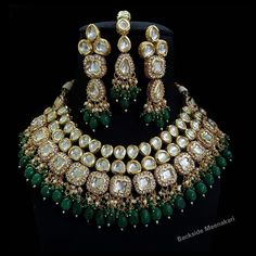 Designer elegant kundan necklace set handcrafted with premium kundans & cat eye beads > Premium quality kundan with back meenakari > For any colour customization please message us Inspired By Sabyasachi Wedding Kundan jewelry Such intricate detailing in this Inspired Heritage Royal Set with Green Emerald drops and Flawless Polki and Diamond work. This set will surely make heads turn .. Finest Kundan work . Bridal Choker Set, Kundan Jewellery Bridal, Traditional Indian Jewellery, Kundan Choker, Bridal Choker, Kundan Set, Bridal Necklace Set, Indian Necklace, Polki Jewellery