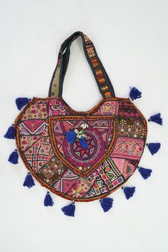 WELCOME TO YOUR SHOP CHANDRA TEXTILES !! This gorgeous Indian Jaipuri Morral is perfect to style with any outfit! It is completely hand-embroidered and made on a waist loom, These beautiful bags are handmade by Indian artisans in Jaipur, Rajasthan. Material - 100% Cotton Fabric, The bag closes with a High-Quality zipper. Our bags are strictly produced by our skilled team with the natural traditional way of craftsmanship. A Perfect Shoulder Bag / Hobo Bag / Tote Bag / Hand Bag to give to an elega Traditional Handmade Multicolor Hobo Bag, Bohemian Multicolor Potli Bag For Everyday Use, Bohemian Multicolor Potli Bag For Festival, Bohemian Embroidered Multicolor Potli Bag, Traditional Handmade Multicolor Embroidered Hobo Bag, Traditional Multicolor Embroidered Bag For Daily Use, Traditional Multicolor Potli Bag For Everyday Use, Traditional Handmade Multicolor Embroidery Hobo Bag, Multicolor Potli Bag For Everyday And Festivals