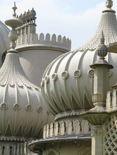 an ornately designed roof and dome on top of a building