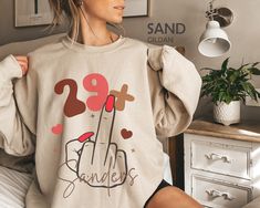 "I Am 29+ Middle Finger Sweatshirt, Personalized 30th Birthday Sweater, Custom 1994 Birthday Party Shirt, Funny I Am 29 Plus Tshirt, 30 Bday HOW TO ORDER ➀ Select color ➁ Select the size (Please check size chart) ✦ True to size. Size up 1-2 sizes for an oversized look. ➂ Add to cart ✦ (Optional) \"Add message to Seller\" on the checkout page. GARMENT FEATURES ✦ Crew neckline ✦ Direct to garment printing - no vinyl, decal, or iron-on technique ✦ Our designs are printed on the garment to last a lo 1994 Birthday, 1984 Birthday, Birthday Sweater, 30th Bday, Birthday Party Shirt, Funny Me, 30th Birthday, 40th Birthday, Party Shirts