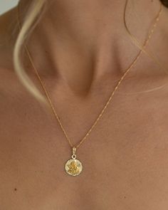 The small angel that is universally with you. Our sweet Angelito pendant is crafted in 14k gold and strung on our shiniest Singapore chain to offer a wholesome touch to your usual neck adornments. We love this necklace in a 16" length - pair it with a few more dainty chains for a charming, layered look. Que duermas con los angelitos. Gold Necklace Combo, Aesthetic Gold Necklace, Necklace Combos, August Moodboard, Necklace Combo, Small Angel, Layering Necklaces, Jewelry Lookbook, Jewelry Inspo