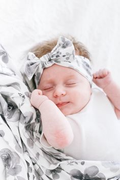 PREMIUM POLYESTER/RAYON BLEND – Our stylish bow headband is designed with baby’s comfort in mind. That’s why we created it with ultra-soft, breathable fabric with just the right hint of stretch.  SIZING - Perfectly sized for newborns, it features enough stretch to grow with baby through the first few months. TRENDY, HIGH QUALITY DESIGNS – At Copper Pearl, we pride ourselves on making high-quality products that always look great on babies, moms, or in your nursery. Our bow headbands are available in a wide range of our on-trend prints that are sure to elevate any baby's style, with more to come! PAIR PERFECTLY WITH COPPER PEARL PRODUCTS – Our trendy bow headbands flaunt our signature prints and patterns and are made to coordinate perfectly with products you already own and love! AN EASY GIF Baby Headband Bow, Trendy Bows, Headband Bow, Baby Bow Headband, Knit Headband, Copper Pearl, Stylish Baby, Baby Headband, Signature Print