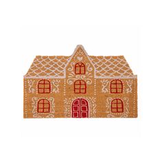 a house shaped door mat with red and white trimmings on the front of it