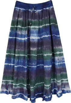 A light and breezy feminine Long Cotton Summer Skirt is exactly what you need for the season! With its harmonious balance of cool tones of blue, purple, and green, it is sure to bring glow to your face.  The skirt is in tie-dye pattern and has an elastic waist for ease of comfort. #tlb #XLPlus #MaxiSkirt #TieDye #CottonMaxiSkirt Casual Tie Dye Beach Skirt, Casual Tie Dye Skirt For The Beach, Casual Tie-dye Beach Skirt, Purple Cotton Beach Skirt, Casual Tie Dye Flowy Skirt, Casual Tie Dye Maxi Skirt For Summer, Casual Tie-dye Maxi Skirt For Summer, Casual Long Tie-dye Skirt, Casual Purple Maxi Skirt For Beach