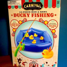 an inflatable ducky fishing toy with rubber ducks