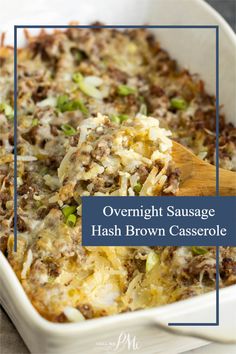 overnight sausage hash browns casserole in a white baking dish