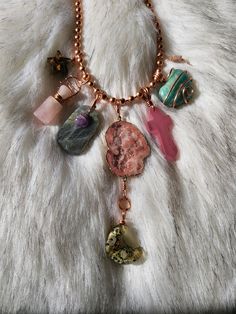 💚 I have some  Beautiful Natural Crystal Pendant Charm necklaces that i customize on a variety of necklaces including  Copper chain Necklaces, Cords necklaces, silver & gold (depending on your preference). All crystal charms will have amazing healing energy that helps balance and align your Chakras. Perfect gift for mom on mothers day, family, friends or just because  For a different Crystal Charm Necklace, message me your bday & 2 to 3 favorite colors along with picking options of how many cry Unique Pendant Charms As Gifts, Spiritual Necklace With Dangling Charms As A Gift, Unique Charm Necklace As Gift, Spiritual Dangle Charm Necklaces As Gift, Unique Jewelry With Dangling Charms For Gift, Unique Jewelry With Dangling Charms As Gift, Unique Personalized Pendant Charm Necklace, Personalized Spiritual Pendant Charm Necklace, Artisan Necklace With Charms And Round Pendant