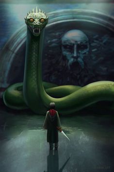 a man standing in front of a green snake with a knife on it's head