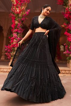 Black attached cancan lehenga with pleated flare. Paired with a padded blouse with all over embroidery in floral tonal pattern using dori, beads and salli work. Comes along with a dupatta. - Aza Fashions Black Pre-draped Saree With Cutdana, Elegant Evening Choli For Navratri, Traditional Lehenga With Unstitched Blouse For Evening, Traditional Evening Lehenga With Unstitched Blouse, Fitted Lehenga With Dupatta For Evening, Traditional Black Sharara For Evening, Fitted Evening Lehenga With Dupatta, Elegant Black Dupatta For Navratri, Fitted Floor-length Lehenga For Evening