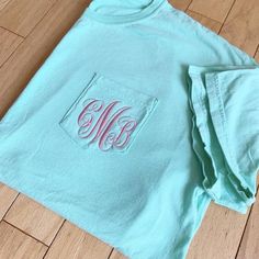 Green Cotton T-shirt With Side Pockets, Blue Monogram Cotton Tops, Monogrammed Short Sleeve Cotton T-shirt, Casual Cotton Monogram T-shirt, Short Sleeve Cotton Monogram Top, Short Sleeve Cotton Tops With Monogram, Short Sleeve Cotton Top With Monogram, Monogram Pocket Tees, Monogram Tote