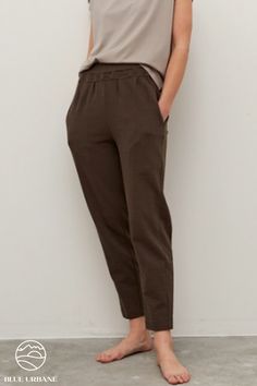 We're all at home more these days and this is the perfect pant to stay comfortable and also stylish in! This cotton pant features an elastic band and pockets. They're perfect for any casual occasion and when you still want to look pulled together. Love these athleisure cotton pants! Relaxed Cotton Pants With Pull-on Style, Cotton Joggers With Tapered Leg And Pull-on Style, Comfortable Straight Sweatpants With Pull-on Style, Elastic Cuffs Sweatpants For Workwear, Everyday Fall Bottoms With Elastic Waistband, Relaxed Fit High-waisted Pull-on Sweatpants, High-waisted Relaxed Fit Pull-on Sweatpants, Versatile Straight Leg Sweatpants With Elastic Waistband, Casual Straight Leg Joggers For Workwear