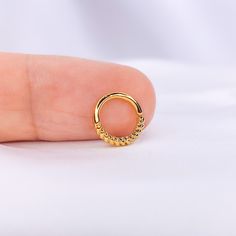 DETAILS ▪ Material: 14k Gold plated over brass ▪ Designed for: Septum, Daith, Rook, Cartilage ▪ Inner diameter: 8mm ▪ Thickness: 16g ▪ Closure: Seamless ring hoop ▪ Handcrafted in Spain SHIPPING & RETURNS SHIPPING POLICY ▪ All orders will be shipped out next day after the order has been received. Tracking Number included! Estimated shipping dates: ▪ USA and Canada: 5-16 business days with DHL ▪ Europe: 3-8 business days with DHL ▪ Spain: 2-4 business days from 4.28$ with Correos España ▪ Rest of Internally Threaded Yellow Gold Hoop Nose Rings, Gold Septum Ring Tarnish Resistant As A Gift, Gold Metal Septum Ring As A Gift, Gold Tarnish Resistant Septum Ring Gift, Gold Tarnish-resistant Septum Ring As Gift, Gold Hoop Metal Piercings, Gold Internally Threaded Septum Ring, Gold Internally Threaded Round Septum Ring, Handmade Gold Hoop Septum Ring