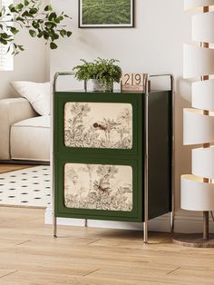 a green cabinet sitting in the corner of a living room