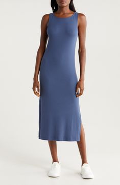 Simple and elevated, this ribbed dress is designed for everyday ease with a scoop neck and side slits in a sleeveless silhouette. 45" length (size medium) Slips on over head Scoop neck Sleeveless Side slits 96% lyocell, 4% elastane Machine wash, tumble dry Made in Peru Casual Ribbed Sleeveless Midi Dress, Solid Sleeveless Seamless Maxi Dress, Casual Sleeveless Ribbed Maxi Dress, Casual Stretch Sleeveless Slip Dress, Casual Sleeveless Stretch Slip Dress, Sleeveless Ribbed Dress For Daywear, Ribbed Sleeveless Dress For Daywear, Sleeveless Ribbed Midi Dress For Daywear, Sleeveless Solid Color Midi Dress For Loungewear