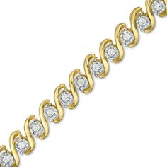 Dress her wrist in the dazzle of this diamond tennis bracelet. Crafted in sterling silver with 14K gold plate, this pleasing design shimmers with diamonds artfully set to enhance size and sparkle. A gold-plated "S" curve embraces each diamond for an elegant look. Radiant with 1/2 ct. t.w. of diamonds and a brilliant buffed luster, this 7.25-inch tennis bracelet secures with a tongue and groove clasp. Yellow Gold Diamond-accented Bracelet For Anniversary, Anniversary Yellow Gold Bracelet With Diamond Accents, Gold Diamond Bracelet For Anniversary, Anniversary Yellow Gold Diamond Bracelet With Prong Setting, Gold Brilliant Cut Bracelet For Anniversary, Gold Bracelet With Single Cut Diamonds For Anniversary, Gold Brilliant Cut Diamond Bracelet For Anniversary, Gold Diamond Bracelet With Single Cut Diamonds For Anniversary, White Gold Bracelet With Diamond Accents For Anniversary