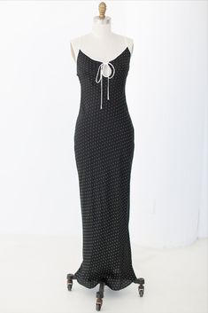 Cut on the bias from luxurious feeling fabric, this maxi dress features a statement keyhole neckline and low-cut back. Betty Dress, Keyhole Neckline, Low Cut, Maxi Dress, Fabric