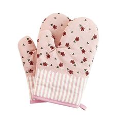 pink oven mitts with red flowers and stripes on the front, one pair is open