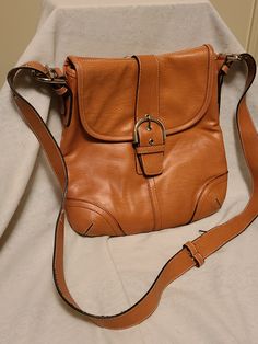 Burnt orange Belle Rose shoulder bag, in fairly good condition, barely used, vintage Classic Orange Crossbody Shoulder Bag, Vintage Brown Bag With Buckle Closure, Vintage Orange Shoulder Bag For Daily Use, Orange Satchel With Adjustable Strap, Orange Satchel Shoulder Bag With Adjustable Strap, Vintage Orange Shoulder Bag, Vintage Orange Tote Shoulder Bag, Vintage Orange Satchel Shoulder Bag, Burnt Orange