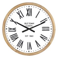 an old town clocks wooden clock with roman numerals and black numbers on white background