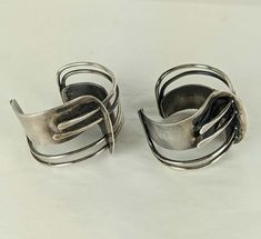 For Sale on 1stDibs - Pair of Iconic Art Smith 'Modernette' Cuffs from the 1940's in sterling silver. Pioneering jeweler Art Smith created some of the most iconic designs in