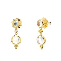 Once thought to be moonlight captured magically in solid form, Blue Moonstone has its own inner glow. The 18K Moon Drop Earrings feature moonstone in an elegant shape that is classic and timeless. Elegant Oval Jewelry With Moon Phase, Elegant Oval Moon Phase Jewelry, Elegant Moon Phase Earrings, Elegant Gold Moon-shaped Earrings, Celestial Round Earrings For Formal Occasions, Celestial Style Round Formal Earrings, Celestial Style Round Earrings For Formal Occasions, Elegant Yellow Gold Moon Phase Earrings, Elegant Moon-shaped Wedding Earrings