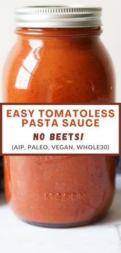 easy tomato sauce in a glass jar with text overlay that says easy tomato pasta sauce no pets / aip, pale, vegan, whole 30