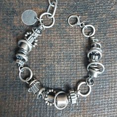 Handmade oxidized sterling silver bracelet - for men and women. The bracelet is made of silver 925.  It is available with either raw (unpolished) or polished silver finish. We offer bracelets in many sizes of the wrist circumference: 6" (15 cm), 6.5" (16,5 cm), 7" (18 cm), 7.5" (19 cm), 8" (20,5 cm), 8.5" (21.5 cm), 9" (23 cm).  Choose the one that is most similar for your wrist circumference and share your actual wrist circumference in the note to your order. This way we can perfectly adjust th Unique Antique Silver Bracelets With Oxidized Finish, Unique Antique Silver Bracelet With Oxidized Finish, Modern Sterling Silver Bracelets With Oxidized Finish, Antique Silver Metal Bracelets With Oxidized Finish, Modern Silver Bracelet With Oxidized Finish, Sterling Silver Bracelet With Oxidized Finish For Everyday, Everyday Sterling Silver Bracelet With Oxidized Finish, Oxidized Sterling Silver Bracelet, Oxidized Silver Bracelet