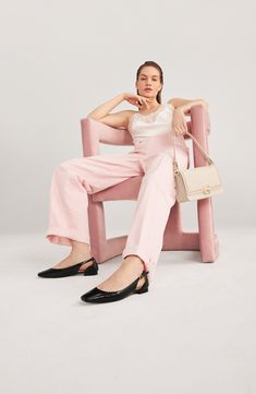 The classic ballet flat gets a contemporary refresh in a unique silhouette with slingback-inspired side cutouts that shut with a gleaming buckle closure. Adjustable slingback strap with buckle closure Leather upper and lining/synthetic sole Imported Casual Ballet Flats For Summer Evenings, Casual Evening Ballet Flats For Summer, Casual Summer Evening Ballet Flats, Casual Slingback Pumps With Buckle Closure For Spring, Chic Flat Slingback Pumps For Evening, Casual Ballet Flats For Spring Evening, Chic Evening Ballet Flats For Spring, Chic Slingback Sandals With Buckle Closure For Spring, Chic Pointed Toe Ballet Flats With Buckle