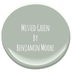 a white painted round with the words, misted green by benjamin moore