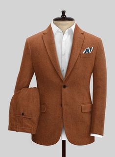 Venture into a stylish era by pulling out Naples Cosmic Tan Tweed Suit, which adds a modern touch to the vintage aesthetics. Further, our suit is cut from a pure wool fabric that showcases a smooth, supple and offers an incredibly sharp drape when worn. Nonetheless, the cloth is cut with expert tailoring, which lets yo Elegant Single Breasted Orange Blazer, Brown Three-piece Suit With Single Button Notch Lapel, Elegant Fitted Orange Suit, Tailored Brown Linen Blazer, Classic Orange Suit With Notch Lapel, Brown Linen Blazer With Welt Pockets, Classic Fitted Orange Suit, Elegant Orange Notch Lapel Suits, Orange Tailored Suit With Notch Lapel