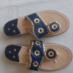 Nwot Jack Rogers Flat Sandal Women's Size 5m Navy And Gold Flip Flops Slip On Casual Shoe Blue Leather Flip Flops For Vacation, Navy Flat Sandals For Summer, Navy Sandals For Summer Beach Season, Blue Leather Flip Flops With Round Toe, Navy Cushioned Sandals For Summer, Navy Slip-on Sandals For Summer, Blue Sandals With Cushioned Footbed And Single Toe Strap, Navy Round Toe Sandals With Cushioned Footbed, Navy Sandals With Removable Insole For Summer