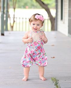 Searching for the perfect attire for your little one's first birthday celebration or a delightful photo session? Look no further! Our adorable and cozy romper is designed to highlight your baby's charm and cuteness. The romper's relaxed, billowy fit and elegant lace tie top not only adds a touch of whimsy but also ensures comfort, allowing for extended wear as your child grows. To maintain the romper's quality and softness, we suggest hand washing and air drying. Our model, which typically fits into size 24 months, showcases the larger size for 1-2-year-olds and still has ample room to move and play. This piece will surely become a cherished part of your little one's wardrobe! *Headband not included Cute Bubble Romper For First Birthday In Spring, Cute Pink Bubble Romper For Birthday, Playful Pink Bubble Romper For Cake Smash, Cute Pink Bubble Romper For Cake Smash, Cute Pink Bubble Romper For First Birthday, White Bubble Romper For First Birthday, Lace Tie Top, Toddler Gift, Lace Tie