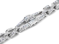 Twinkle to rival the stars in this diamond bracelet! A geometric line bracelet is formed in platinum and set with both round and baguette diamonds for stunning sparkle that is sure to make a statement. Signed Sophia D. Platinum Diamond Bracelet With Baguette Cut, Platinum Diamond Bracelet With Brilliant And Baguette Cut, Diamond White Platinum Bracelet With Baguette Diamonds, Platinum Diamond Bracelet With Baguette Diamonds In Diamond White, Diamond White Baguette Cut Platinum Bracelet, Platinum Tennis Bracelet With Baguette Diamonds, Silver Platinum Diamond Bracelet With Baguette Cut, Platinum Diamond Bracelet With Baguette Cut In Silver, Silver Baguette Cut Platinum Diamond Bracelet