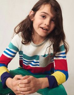 This Mini Boden Fun Breton T-Shirt is a stylish staple for any wardrobe. Its classic breton styling has been given a modern twist with a multi-wide stripe, crafted from comfortable, breathable cotton. Perfect for everyday wear, stylish and comfortable. Details: Machine Washable Casual Multicolor Tops With Striped Sleeves, Multicolor Tops With Contrast Stripes For Spring, Multicolor Horizontal Stripe Tops For Spring, Multicolor Striped Sleeve Tops For Spring, Multicolor Crew Neck Top With Contrast Stripes, Spring Multicolor Tops With Striped Sleeves, Relaxed Fit White Tops With Striped Sleeves, White Relaxed Fit Top With Striped Hem, White Tops With Striped Sleeves Relaxed Fit