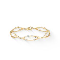 14K Yellow Gold Celestial Bracelet with 0.84 Carats (total weight) of Diamonds. The bracelet measures approximately 7".