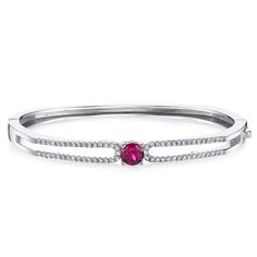 The cherry on top Rubies make everything better, that's why we call them the "cherry on top" gemstone. This classic bracelet features round shape Peora created Ruby gemstones in .925 sterling silver. Responsibly sourced in every sense, our created Ruby gemstones are physically, chemically, and optically identical to their natural counterparts. We're big fans of eco-luxury. Handcrafted in pure .925 sterling silver goodness, this bracelet has been carefully coated in an elegant rhodium finish. Our artisans are expertly trained in this process which fortifies the bracelet's strength, shine and brilliance. Looking for a special jewelry gift for someone special? Our concierge stylists are here to help with all of your jewelry questions. Each purchase comes beautifully packed in one of our signa Jewelry Questions, Classic Bracelets, Bracelet Sterling Silver, Special Jewelry, Hinged Bangle, Gemstone Bracelets, Jewelry Gift Box, Jewellery Display, Stone Bracelet