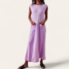 Free People Beach Nikki Cotton Maxi Dress Roundneck Sleeveless Muscle Tee Style 2 Front Pockets Front Pleating In Middle Of Pockets Midi Maxi Length Solid Stretchy Soft Lightweight Cotton Brand New With Tags Will Definetly Fit Xs/S- Mannequin Is Xs/2 Pretty Lilac Lavender Purple Color. Perfect To Throw On/Over Swimsuit. Beachy, Summer, Vacation, Travel, Easy, Casual, Everyday Size Xs Pit To Pit 16" Waist 17" Length 53" Color Purple Excellent New With Tags Condition! Sleeveless Maxi Dress For Beach Daywear, Sleeveless Maxi Dress For Beach Season, Purple Sleeveless Maxi Dress For Beach Season, Sleeveless Purple Maxi Dress For Beach Season, Casual Maxi Dress For Beach Season Loungewear, Sleeveless Cotton Maxi Dress For Loungewear, Casual Summer Lounge Maxi Dress, Casual Sleeveless Maxi Dress For Loungewear, Casual Summer Maxi Dress For Loungewear