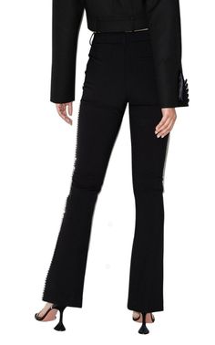 Elevate your look and make a subtle statement in these wool-blend pants with jeweled stripe details down the sides of the leg.Belt loopsHook-and-bar closureWaist slip pocketsJeweled embellished stripes down sides of pants43% polyester, 33% virgin wool, 20% polyamide, 4% elastaneLining: 60% viscose, 40% polyesterDry cleanMade in USA Chic Fitted Embellished Bottoms, Luxury Stretch Bottoms For Party, Chic Embellished Fitted Pants, Embellished Straight Pants For Evening, Chic High Waist Embellished Pants, Chic Embellished Evening Bottoms, Embellished Straight Evening Bottoms, Elegant Embellished Straight Pants, Fitted Embellished Trousers