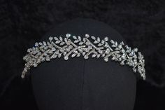 Beautiful and Elegant Luxury Wedding Bridal Headband Elevate your bridal look with our Bridal Headpiece! Handcrafted with crystals, and delicate floral accents, this piece adds a touch of enchantment to your special day. Made with simulated diamonds (AAA Zirconia Crystals)  Adjusts to any head size and is secured with pins Guaranteed to sparkle on your special wedding day! Check out our page https://dmluxurybridal.etsy.com for more designs in stock! Headband For Wedding, Crystal Bridal Headpiece, Bridal Hair Accessory, Bridal Hairstyle, Bridal Headpiece, Bridal Look, Luxury Bridal, Bridal Headband, Bridal Headpieces